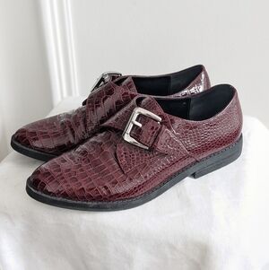 Patent leather loafers by Aldo